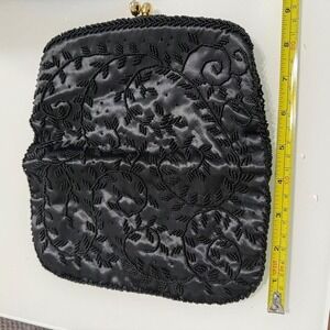 Black beaded and‎ sequined evening clutch bag with gold accents